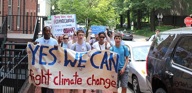   Climate activists march to the entrance of Georgetown University before President Obama's speech on climate change. Photo: 350.org via Flickr