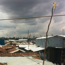 View over the Mukuru informal settlement in Nairobi, showing corrugated roofs