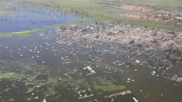Aerial view of a floded town and vegetation