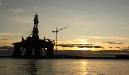 An oil platform in the sea.