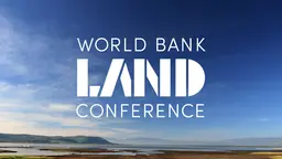 The words' World Bank Land Conference' in bold, stark lettering, over a pretty landscape.