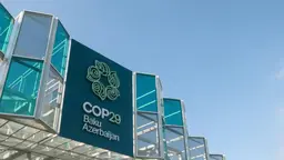 The COP29 logo on one of the buildings in Baku