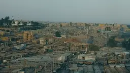 Landscape image of Nairobi with lots of rooftops showing.
