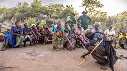 Community members from Tanzania gathered to discuss.