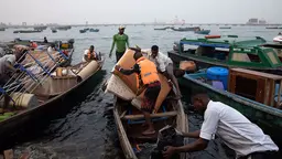 Fishers on small boats have their belongings searched while the boats are afloat.