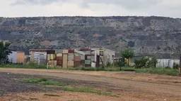 Informal settlement on the edge of a coal mine, Phola, Mpumalanga Province