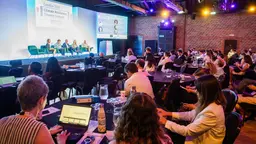 Audience members listening to the opening plenary speeches of the London Climate Resilience Finance Summit 2026.