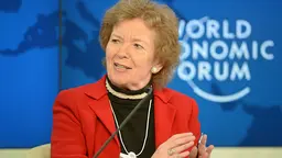 A woman answers a question during an interview.