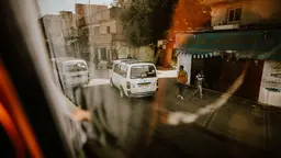 Minibuses on the streets of a busy city in Egypt. Bus drivers were among key groups affected by the subsidy reform because diesel prices.