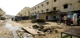 Street in Karachi, Pakistan with overflowing sewage. 