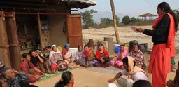 Women discuss forest management at a Community Forest User Group meeting in Nepal. 