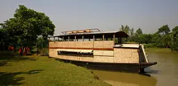 A boat sits on a river in Bangladesh. 