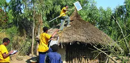 A house in Rema gets fitted with solar panels.