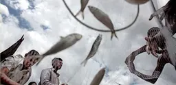 Fishermen collecting the day's catch