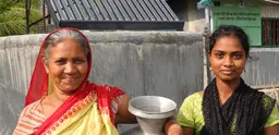 Collecting water from a solar-based purification system supplied by CAFOD. Chila Union, Mongla District, Bangladesh. Photo: Photo: Paula Nyunt / CAFOD