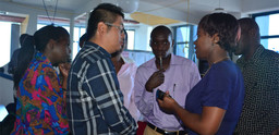 A Chinese journalist interviews fellow journalists in Kenya (Photo: YiDe Media)