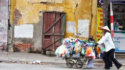 People need at least US$50 to survive for a month in Hanoi. This is twice the official urban poverty line (Photo via Commons Wikimedia/Google licence)