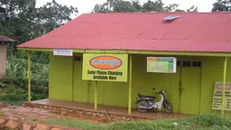 Solar phone charging on a Ugandan island shows even isolated areas in Africa are getting connected by mobile phones and creating demand for energy (Photo: futureatlas.com/blog/)