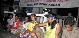 A group of men having a discussion