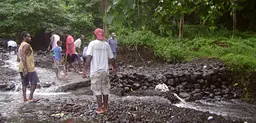 Vanuatu is one of the Least Developed Countries, and is increasingly affected by climate change. Here local people are constructing a river crossing using rocks and coral after flooding destroyed a bridge (Photo: 350.org, Creative Commons via Flickr)