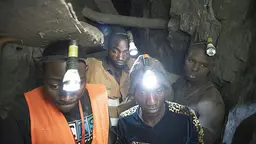 Employees work deep within a tunnel at the Nsangano Gold Mine, Mawemeru village in Geita District, Tanzania (Photo: copyright Brian Sokol/Panos Pictures)