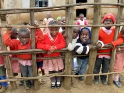 Children at an informal school in the Kibera area of Nairobi. Providing free education is one way to reduce urban poverty (Photo: Christy Gillmore, Creative Commons via Flickr)