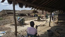Women crush and separate rocks containing gold ore for extraction at Nsangano Gold Mine, Mawemeru village, Geita, Tanzania (Photo: Brian Sokol/Panos Pictures)