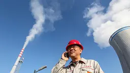 Wang Zhi, assistant production manager of Jiamusi Zhongheng Thermoelectric Ltd, which was built in 1999 to provide 1.75 million GJ annually for Dalkia with an annual coal consumption of 350,000 tons (Photo: Asian Development Bank, Creative Commons, via Flickr)