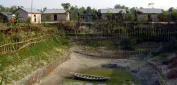 Bangladesh is highly vulnerable to climate change and is at the forefront of adaptation efforts. This homestead has been designed to offer flood protection (Photo: CGIAR, Creative Commons via Flickr)