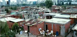 The Retiro district of Buenos Aires features affluent shopping and business areas close to a large shanty town where many homes don't have running water (Photo: Mark Edwards/IIED)