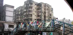 Mumbai's Dharavi settlement has a thriving informal economy. The government's redevelopment schemes have been hit by controversy and stalled for more than a decade (Photo: Jon Hurd, Creative Commons via Flickr)