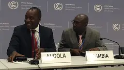 Least Developed Countries Group chair Giza Gaspar-Martins, left, is pictured with his predecessor, Pa Ousman Jarju