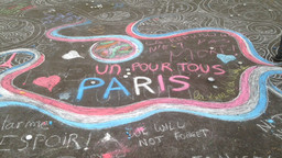 People use the pavement on Boulevard Richard Lenoir, close to the Bataclan concert venue which was the focus of the Paris attacks on 13 November, 2015, to share messages of support, and hope (Photo: Gael_Lombart, Creative Commons, via Flickr)