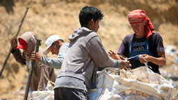 Waste pickers packing up the recyclable materials, Peru (Photo: Alex Proimos, Creative Commons via Flickr)