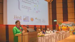 An image of Saleemul Huq at the podium giving a speech. On the final day of the CBA10 conference, he called for federations and communities of the urban poor to be better utilised by urban developers, climate change practitioners and local government to mainstream local adaptation (Photo: ICCCAD, Creative Commons, via Flickr)