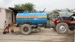 Getting water from a tanker in Vijinapura, India. Partnerships between local government and slum/shack dweller organisations can help deliver urban development goals (Photo: cstepin, Creative Commons via Flickr)
