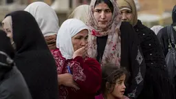 Three generations of Syrian refugees queuing at a registration point on the Syria/Lebanon border. The United Nations says 4.8 million people have fled the conflict in Syria (Photo: UNHCR/ M. Hofer, Creative Commons via Flickr)