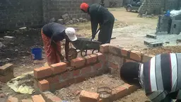 A slum is upgraded in Zambia. Local urban poor organisations are working with local governments to solve problems, but need financial support (Photo: Shack/Slum Dwellers International (SDI), via Google licence)