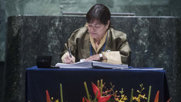 The Permanent Representative of the Kingdom of Bhutan to the UN, Kunzang Choden Namgyel, signs the Paris Agreement on Climate Change (Photo: Amanda Voisard, UN Photo)