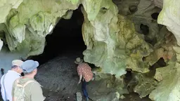 A tour group from ecotourism business Adventures in the Last Corridor explore possible caving tour options (Photo: Cathy Smith)