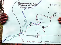 A map shows new walking trails at the edge of the park that have been developed to encourage tourists to explore more of Bwindi and spend money on local products (Photo: Peter Nizette)