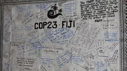 Messages about a better future adorn a wall-hanging in the Fiji Pavilio at COP23 (Photo: Matt Wright/IIED)