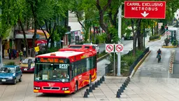 In Mexico City, the Metrobus BRT system carries roughly 250,000 people daily. It cuts workers' travel times and also helps to reduce carbon emissions (Photo: City Clock Magazine, Creative Commons via Flickr)