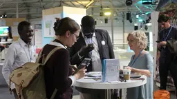 IIED communications senior coordinator Julie Hill talks to COP23 delegates in Bonn, Germany 