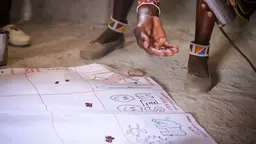Members of the Olderkesi Conservancy in Kenya scoring strategies for engaging communities in tackling IWT for effectiveness (Photo: Micah Conway)