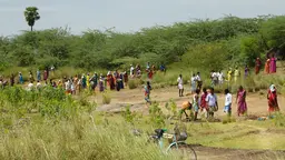 Villagers in India dig out a silted-up water tank as part of the Mahatma Gandhi National Rural Employment Act (Photo: McKay Savage, Creative Commons via Flickr)