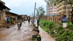 A flooded street in an informal settlement