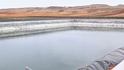 A reservoir in a desert landscape