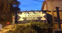 A canopy above the entrance to a mine. Written on the canopy is 'Bienvenidos a Marmato" - welcome to Marmato