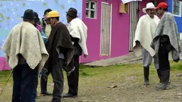 A group of men in felt hats and woollen capes